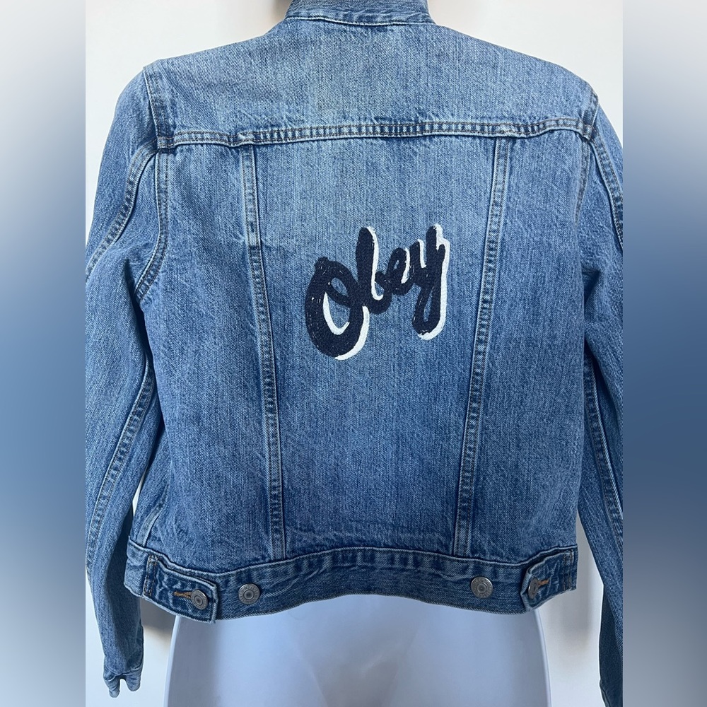 Vintage denim jacket w/ “OBEY” embroidery. Size Medium, fits like a SMALL